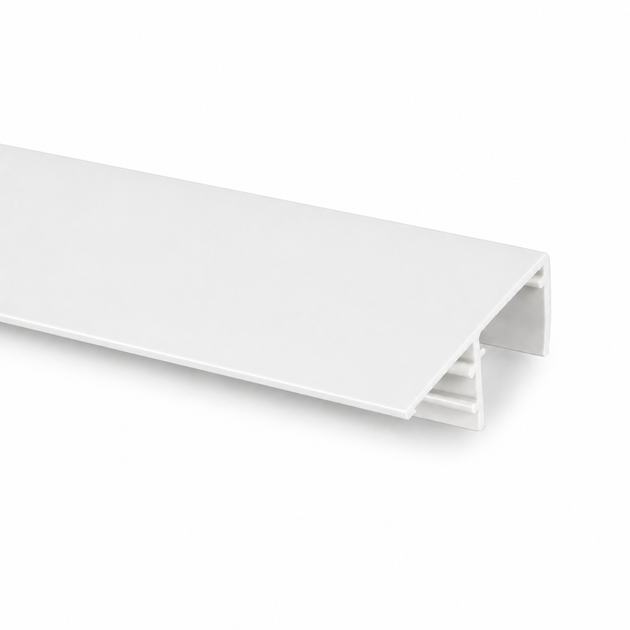 White polycarbonate side flashing profile for finishing the edges of multiwall polycarbonate roofing sheets.
