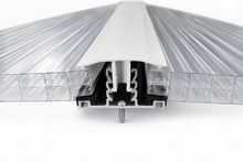 Cross-section of a white PolycarbonateX glazing bar with 16mm clear triplewall polycarbonate sheets showing the aluminium base, snap-fit top cap and gasket system.